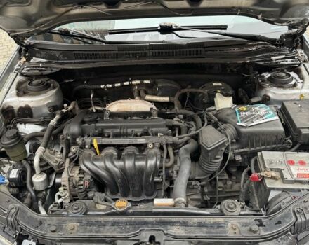 Синий Киа Черато, объемом двигателя 1.6 л и пробегом 280 тыс. км за 2750 $, фото 9 на Automoto.ua