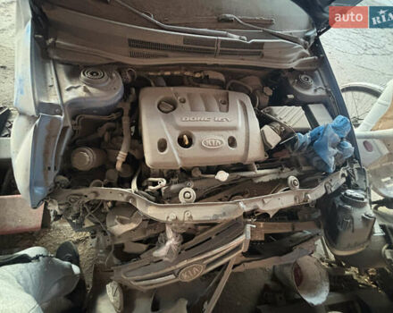 Синий Киа Черато, объемом двигателя 1.6 л и пробегом 140 тыс. км за 1400 $, фото 2 на Automoto.ua