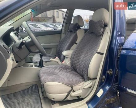 Синій Кіа Черато, об'ємом двигуна 2 л та пробігом 233 тис. км за 4690 $, фото 8 на Automoto.ua