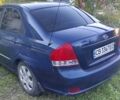 Синий Киа Черато, объемом двигателя 1.59 л и пробегом 208 тыс. км за 3700 $, фото 2 на Automoto.ua