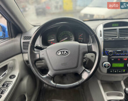 Синий Киа Черато, объемом двигателя 1.59 л и пробегом 258 тыс. км за 3000 $, фото 12 на Automoto.ua