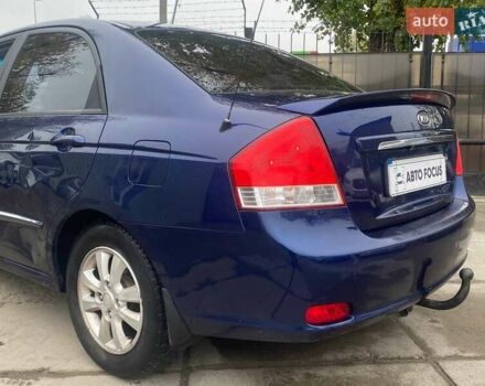 Синій Кіа Черато, об'ємом двигуна 2 л та пробігом 233 тис. км за 4690 $, фото 7 на Automoto.ua