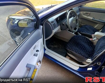 Синий Киа Черато, объемом двигателя 1.6 л и пробегом 270 тыс. км за 4950 $, фото 5 на Automoto.ua