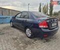 Синий Киа Черато, объемом двигателя 1.98 л и пробегом 252 тыс. км за 4200 $, фото 1 на Automoto.ua