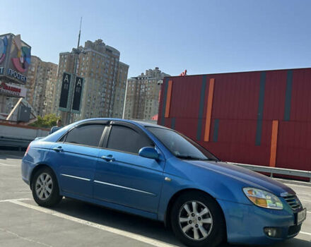 Синий Киа Черато, объемом двигателя 2 л и пробегом 226 тыс. км за 5200 $, фото 11 на Automoto.ua