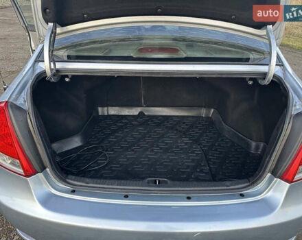 Синий Киа Черато, объемом двигателя 1.6 л и пробегом 192 тыс. км за 4400 $, фото 12 на Automoto.ua