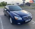 Синий Киа Черато, объемом двигателя 2 л и пробегом 110 тыс. км за 5999 $, фото 1 на Automoto.ua