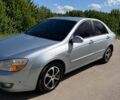 Синій Кіа Черато, об'ємом двигуна 1.6 л та пробігом 287 тис. км за 4500 $, фото 1 на Automoto.ua