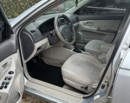 Синий Киа Черато, объемом двигателя 1.6 л и пробегом 280 тыс. км за 2750 $, фото 8 на Automoto.ua