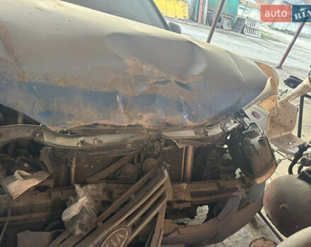 Синий Киа Черато, объемом двигателя 1.6 л и пробегом 140 тыс. км за 1400 $, фото 3 на Automoto.ua