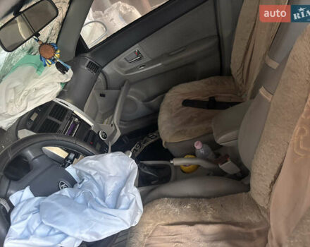 Синий Киа Черато, объемом двигателя 1.6 л и пробегом 140 тыс. км за 1400 $, фото 12 на Automoto.ua