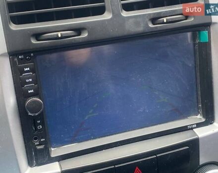 Синій Кіа Черато, об'ємом двигуна 2 л та пробігом 233 тис. км за 4690 $, фото 16 на Automoto.ua