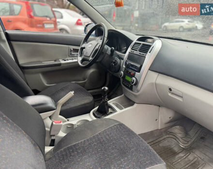 Синий Киа Черато, объемом двигателя 1.59 л и пробегом 258 тыс. км за 3000 $, фото 10 на Automoto.ua