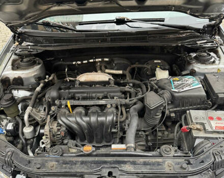 Синий Киа Черато, объемом двигателя 1.6 л и пробегом 280 тыс. км за 2750 $, фото 10 на Automoto.ua