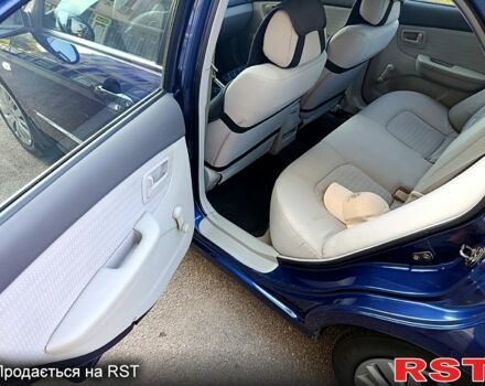 Синий Киа Черато, объемом двигателя 1.6 л и пробегом 270 тыс. км за 4950 $, фото 6 на Automoto.ua