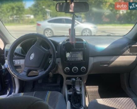Синий Киа Черато, объемом двигателя 1.6 л и пробегом 255 тыс. км за 3300 $, фото 11 на Automoto.ua