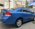 Синий Киа Черато, объемом двигателя 2 л и пробегом 270 тыс. км за 3600 $, фото 4 на Automoto.ua
