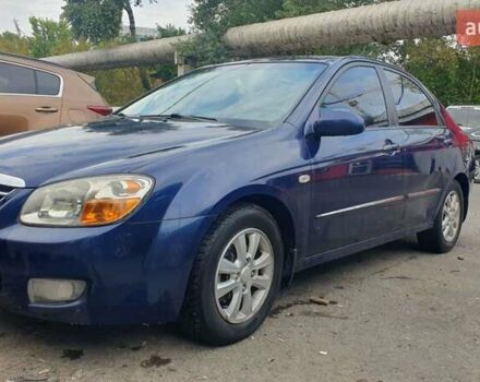 Синій Кіа Черато, об'ємом двигуна 2 л та пробігом 233 тис. км за 3900 $, фото 2 на Automoto.ua