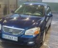 Синий Киа Черато, объемом двигателя 2 л и пробегом 300 тыс. км за 3500 $, фото 1 на Automoto.ua