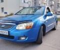 Синій Кіа Черато, об'ємом двигуна 2 л та пробігом 300 тис. км за 4000 $, фото 1 на Automoto.ua