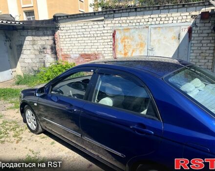 Синій Кіа Черато, об'ємом двигуна 1.6 л та пробігом 170 тис. км за 4400 $, фото 3 на Automoto.ua