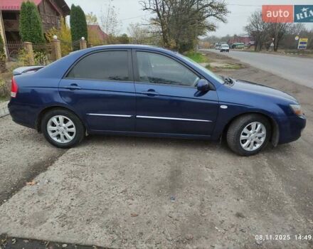 Синий Киа Черато, объемом двигателя 1.98 л и пробегом 246 тыс. км за 4400 $, фото 8 на Automoto.ua