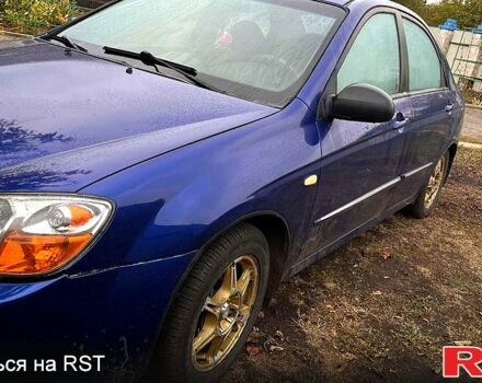 Синий Киа Черато, объемом двигателя 1.6 л и пробегом 230 тыс. км за 3700 $, фото 2 на Automoto.ua