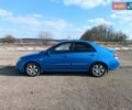 Синій Кіа Черато, об'ємом двигуна 1.59 л та пробігом 165 тис. км за 5150 $, фото 2 на Automoto.ua