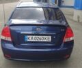 Синий Киа Черато, объемом двигателя 2 л и пробегом 420 тыс. км за 3900 $, фото 3 на Automoto.ua