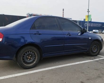 Синий Киа Черато, объемом двигателя 2 л и пробегом 253 тыс. км за 4900 $, фото 3 на Automoto.ua