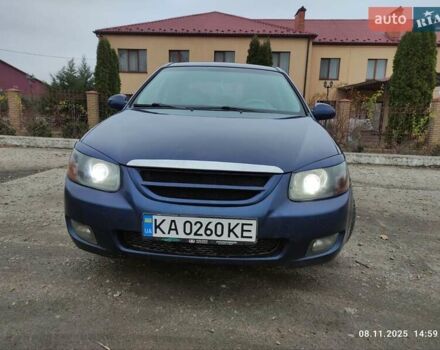 Синий Киа Черато, объемом двигателя 1.98 л и пробегом 246 тыс. км за 4400 $, фото 3 на Automoto.ua