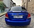 Синій Кіа Черато, об'ємом двигуна 2 л та пробігом 251 тис. км за 4700 $, фото 3 на Automoto.ua