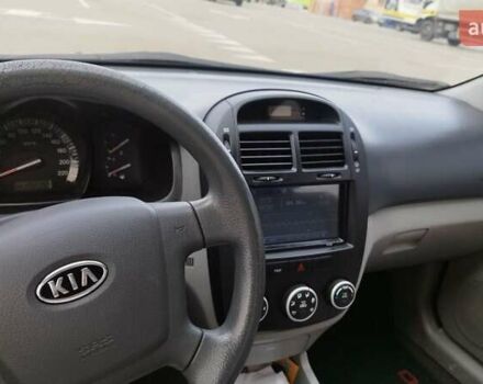 Синий Киа Черато, объемом двигателя 1.59 л и пробегом 253 тыс. км за 4700 $, фото 6 на Automoto.ua