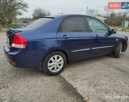 Синий Киа Черато, объемом двигателя 1.98 л и пробегом 246 тыс. км за 4400 $, фото 14 на Automoto.ua