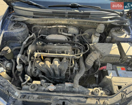 Синий Киа Черато, объемом двигателя 1.59 л и пробегом 250 тыс. км за 3100 $, фото 36 на Automoto.ua