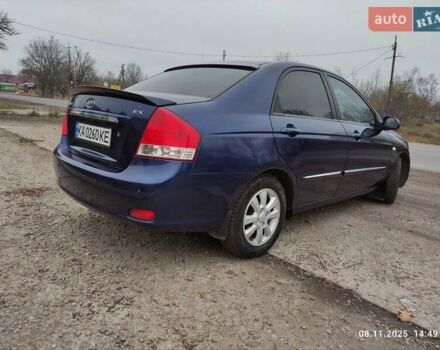 Синий Киа Черато, объемом двигателя 1.98 л и пробегом 246 тыс. км за 4400 $, фото 6 на Automoto.ua