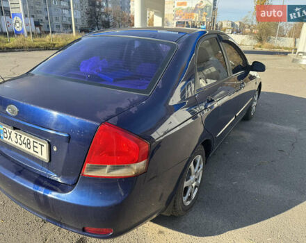 Синий Киа Черато, объемом двигателя 1.59 л и пробегом 250 тыс. км за 3100 $, фото 23 на Automoto.ua