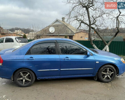 Синій Кіа Черато, об'ємом двигуна 2 л та пробігом 420 тис. км за 2500 $, фото 5 на Automoto.ua