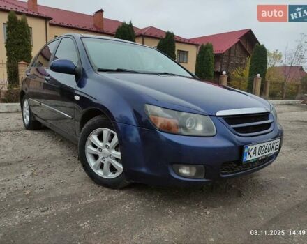 Синий Киа Черато, объемом двигателя 1.98 л и пробегом 246 тыс. км за 4400 $, фото 23 на Automoto.ua