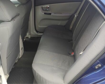 Синий Киа Черато, объемом двигателя 2 л и пробегом 420 тыс. км за 3900 $, фото 4 на Automoto.ua