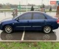Синій Кіа Черато, об'ємом двигуна 1.6 л та пробігом 255 тис. км за 4600 $, фото 2 на Automoto.ua