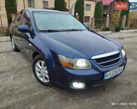 Синий Киа Черато, объемом двигателя 1.98 л и пробегом 246 тыс. км за 4400 $, фото 5 на Automoto.ua