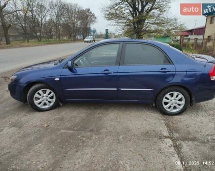 Синий Киа Черато, объемом двигателя 1.98 л и пробегом 246 тыс. км за 4400 $, фото 7 на Automoto.ua