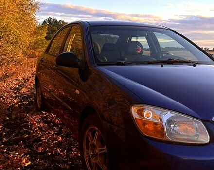 Синий Киа Черато, объемом двигателя 1.6 л и пробегом 230 тыс. км за 3700 $, фото 7 на Automoto.ua