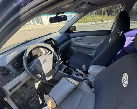 Синий Киа Черато, объемом двигателя 1.59 л и пробегом 250 тыс. км за 3100 $, фото 38 на Automoto.ua