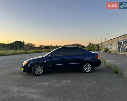 Синий Киа Черато, объемом двигателя 2 л и пробегом 258 тыс. км за 5500 $, фото 5 на Automoto.ua