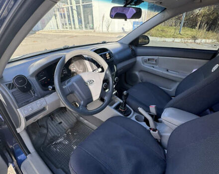 Синий Киа Черато, объемом двигателя 1.59 л и пробегом 250 тыс. км за 3100 $, фото 37 на Automoto.ua