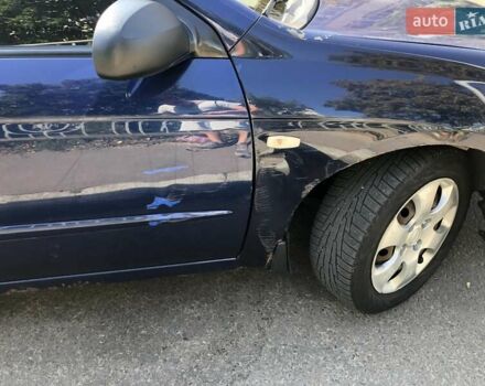 Синий Киа Черато, объемом двигателя 1.6 л и пробегом 292 тыс. км за 4400 $, фото 4 на Automoto.ua