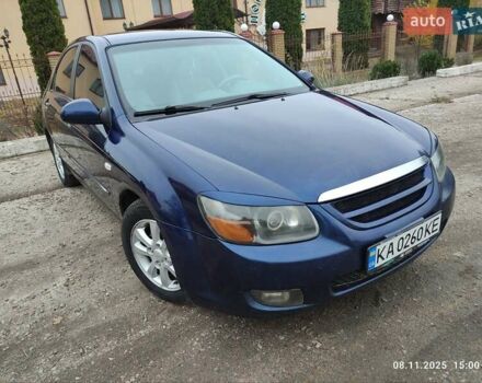 Синий Киа Черато, объемом двигателя 1.98 л и пробегом 246 тыс. км за 4400 $, фото 4 на Automoto.ua
