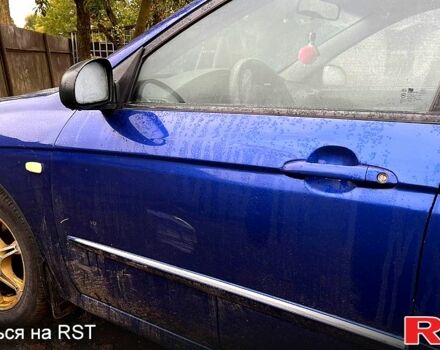 Синий Киа Черато, объемом двигателя 1.6 л и пробегом 230 тыс. км за 3700 $, фото 1 на Automoto.ua